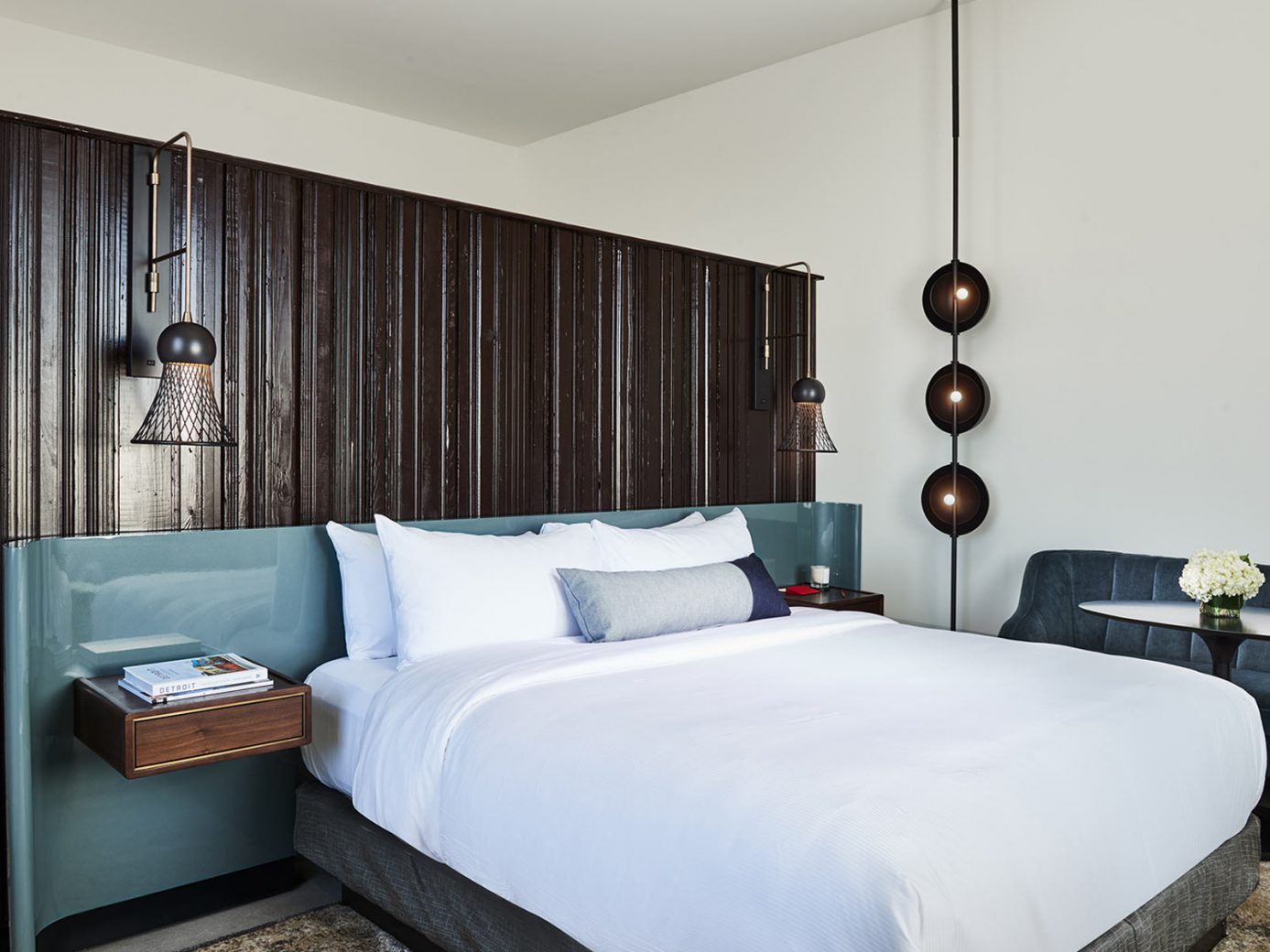 Detroit boutique hotel room with a wooden divider