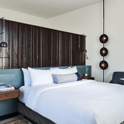 Detroit boutique hotel room with a wooden divider