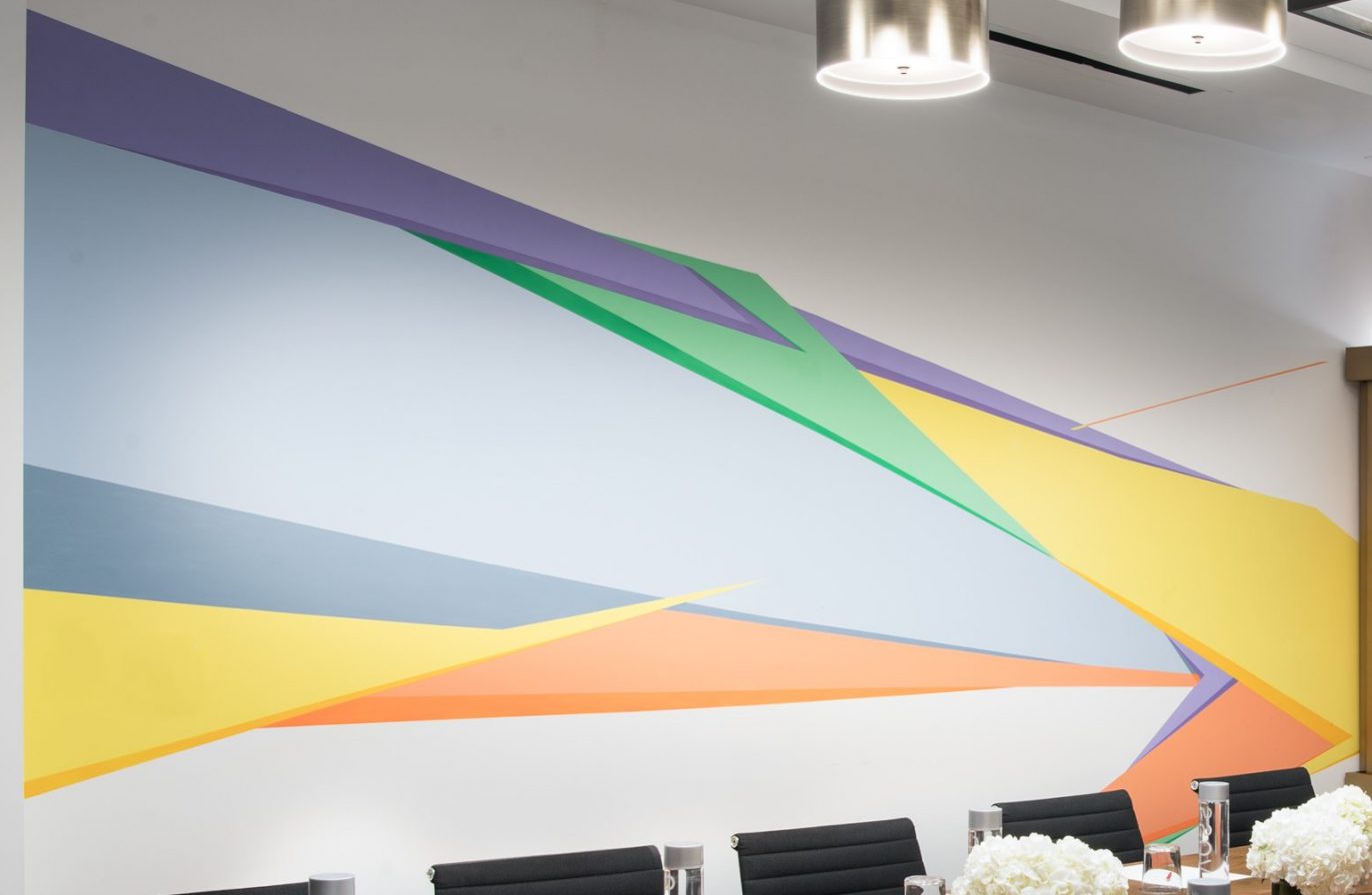 Colorful geometric artwork on the wall of our Detroit, MI lodging