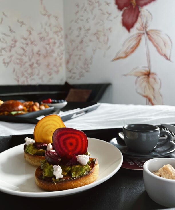 In-room dining trays with classy food at our boutique Detroit hotel