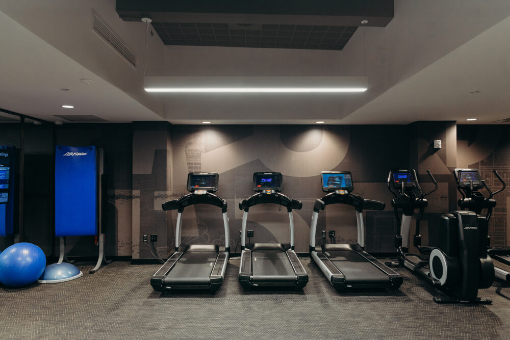 Treadmill, elliptical, exercise mats, and bosu balls at the hotel fitness center in downtown Detroit.