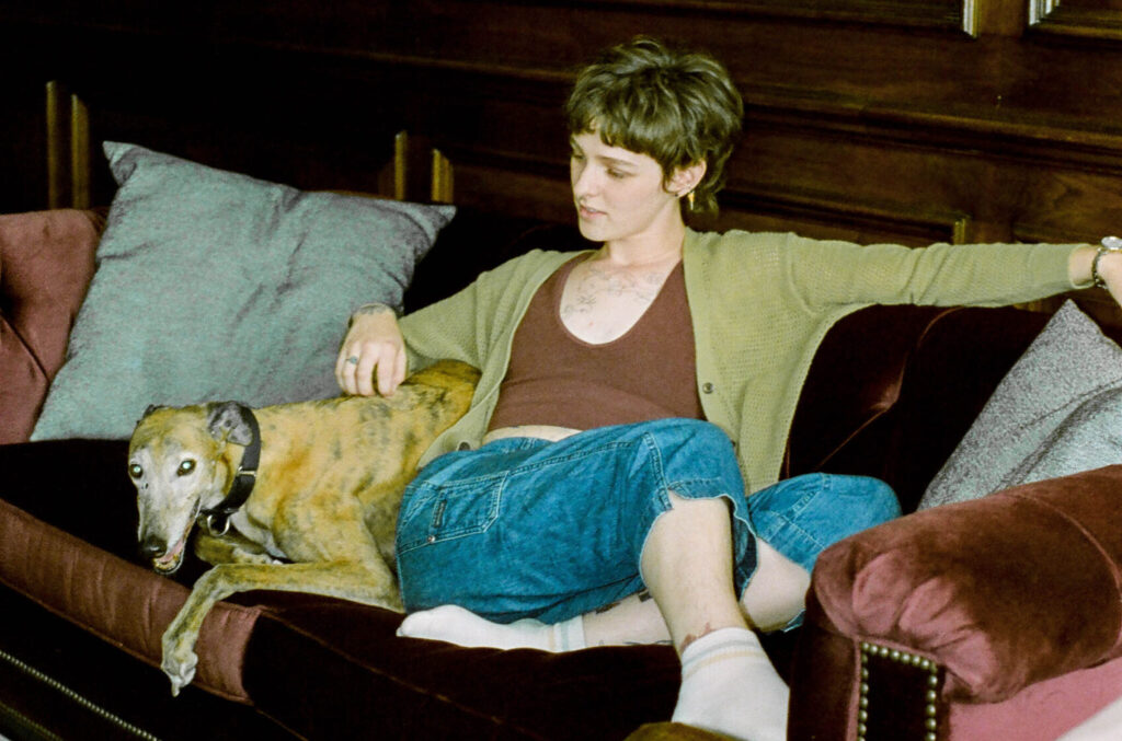 woman and dog on bed