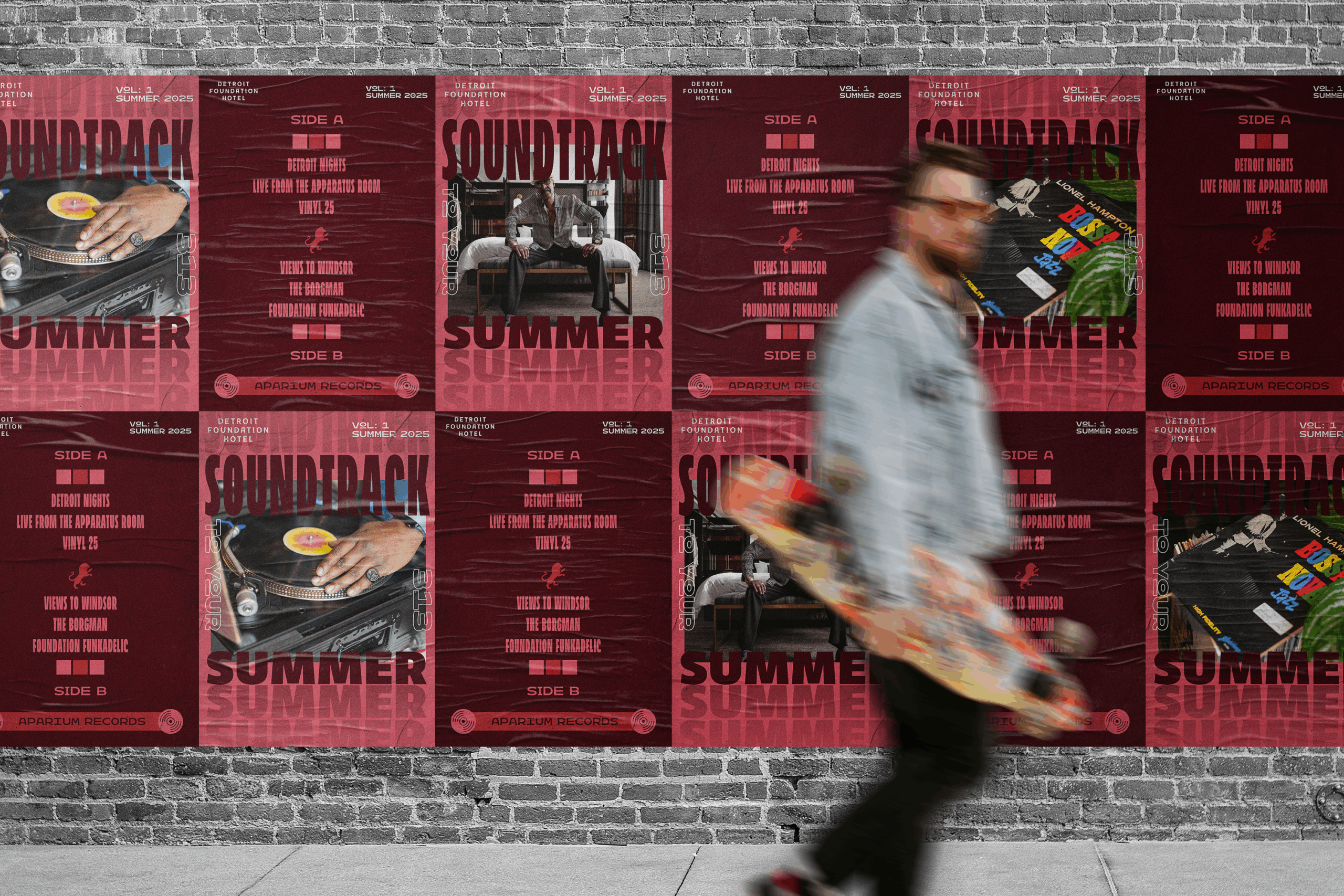 Person walking in front of Detroit Concert Posters